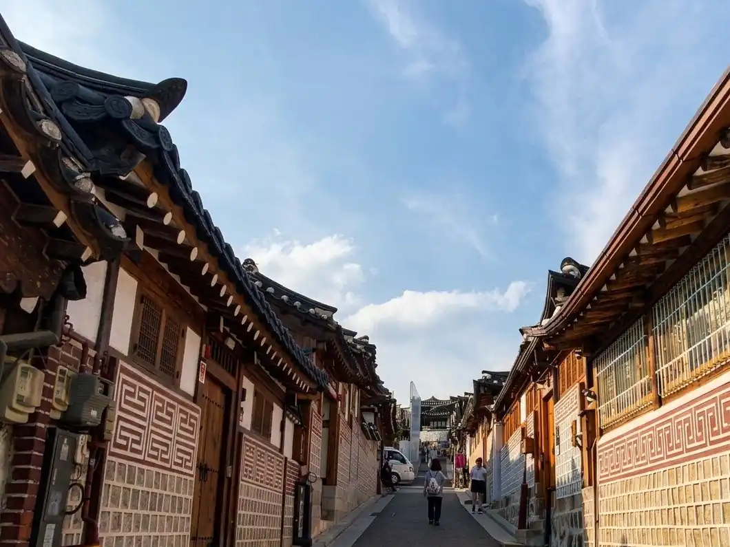 A quiet hanok street with tiled roofs in Bukchon