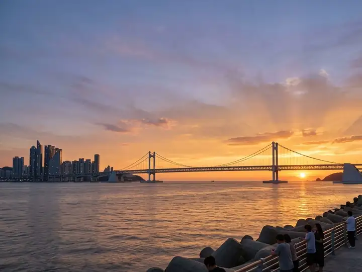 Gwangan Bridge stretching across the sea at sunset in Busan