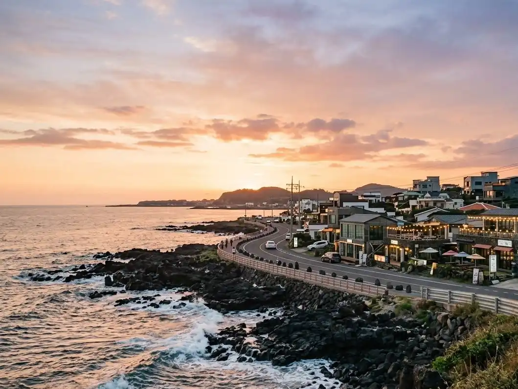 Cafés along a rocky shoreline at sunset in Aewol
